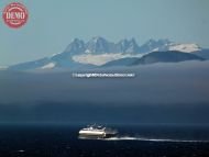 Alaska’s Coastal Mountains Glacier Clouds Ship